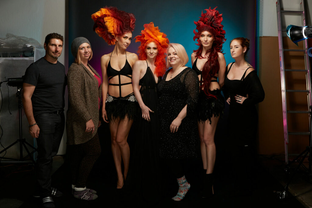 a group photo of the models and the creative team behind a conceptual hair photo shoot